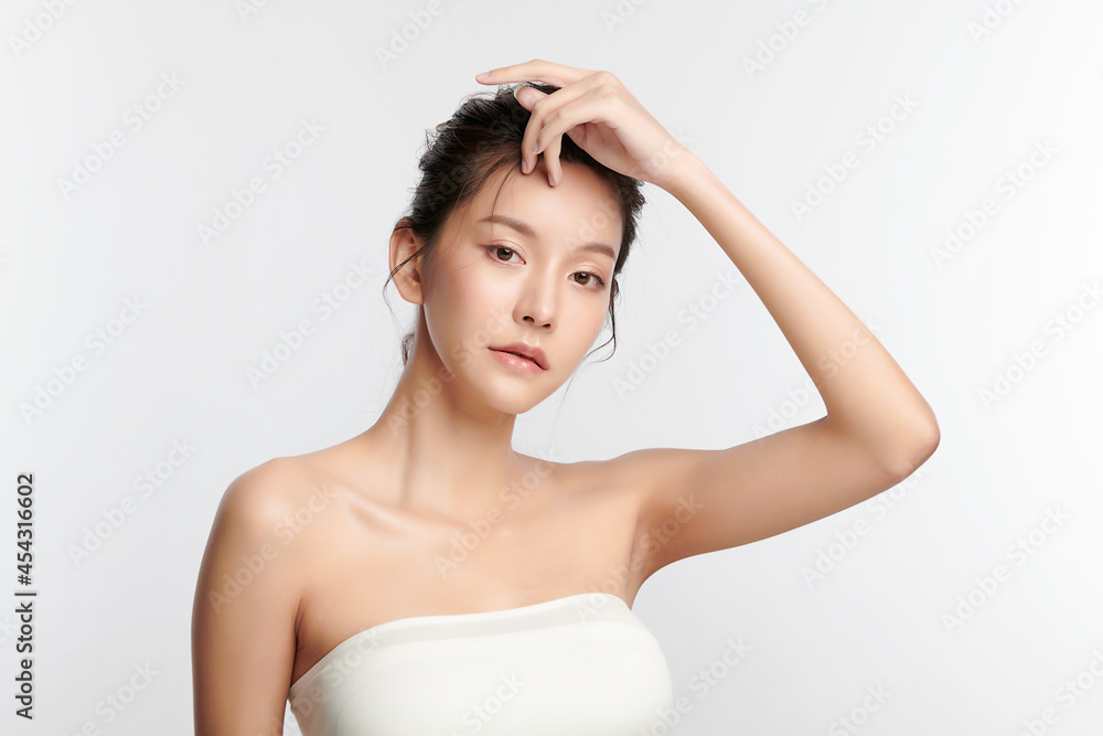 Beautiful young asian woman with clean fresh skin on white background, Face care, Facial treatment, Cosmetology, beauty and spa, Asian women portrait. Beautiful young asian woman with clean fresh skin on white background, Face care, Facial treatment, Cosmetology, beauty and spa, Asian women portrait.