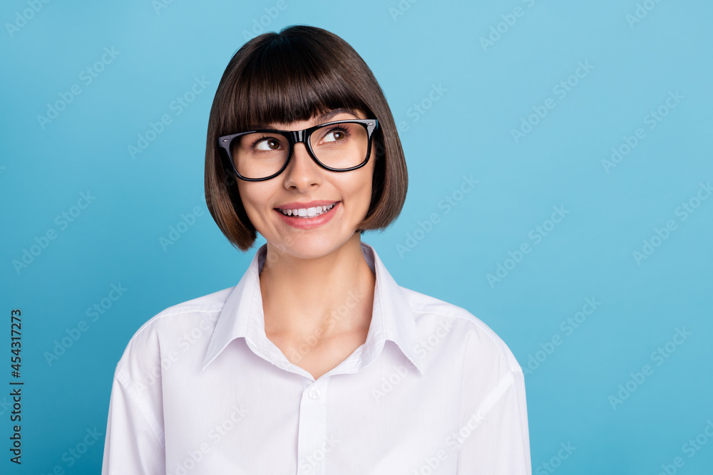 Portrait of attractive cheerful minded experienced girl specialist creating solution isolated over bright blue color background Portrait of attractive cheerful minded experienced girl specialist creating solution isolated over bright blue color background