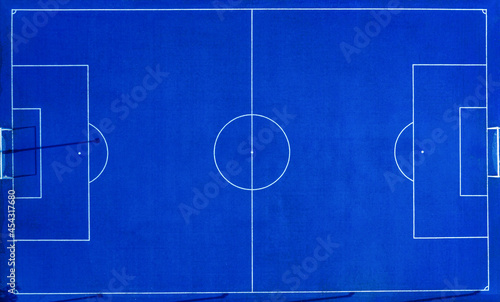Aerial view of blue artificial turf futsal field. © chanchai