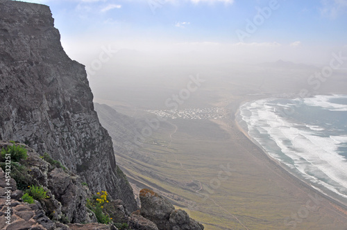 Steep coastal landscape on canary island Lanazrote photo