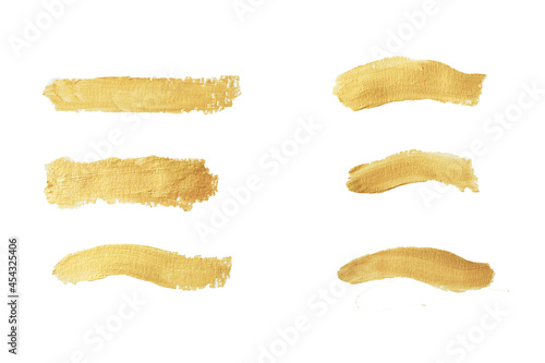 Gold paint stroke set. Gold brush abstract art illustration. Gold glittering design art brush stroke. creative set yellow paint isolated collection. Design golden stroke effect brush color painting.