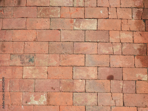 Clay ancient brick flooring tilles. Historical tilled pavement