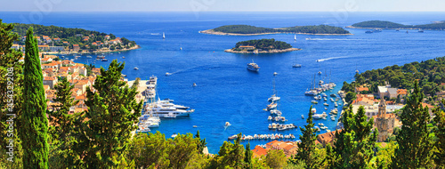 Coastal summer landscape, panorama - top view of the City Harbour of the town of Hvar and Paklinski Islands, the island of Hvar, the Adriatic coast of Croatia