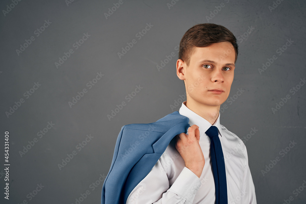 business man shirt with tie jacket on shoulder self-confidence in the office business man shirt with tie jacket on shoulder self-confidence in the office