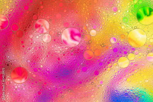   bstract image of oil and water bubbles of various colors. Colorful artistic image of oil drop on water for modern and creation design background.