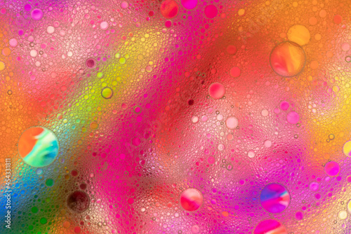 Аbstract image of oil and water bubbles of various colors. Colorful artistic image of oil drop on water for modern and creation design background.