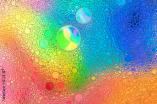   bstract image of oil and water bubbles of various colors. Colorful artistic image of oil drop on water for modern and creation design background.