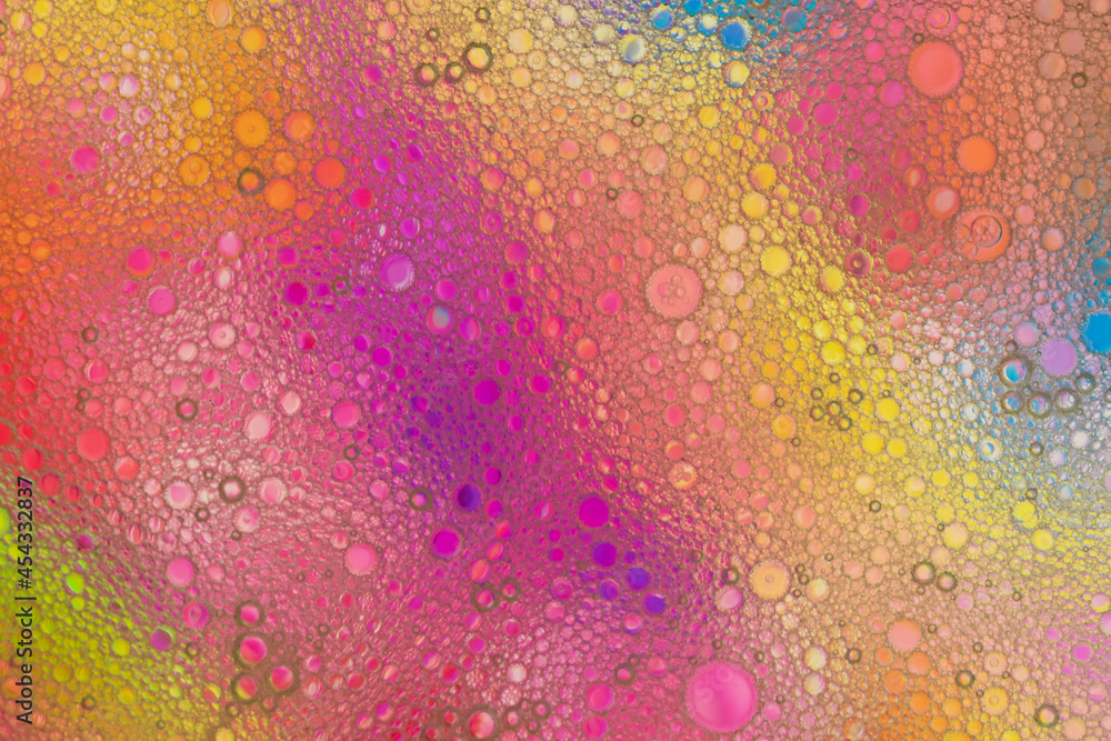 Аbstract image of oil and water bubbles of various colors. Colorful artistic image of oil drop on water for modern and creation design background.