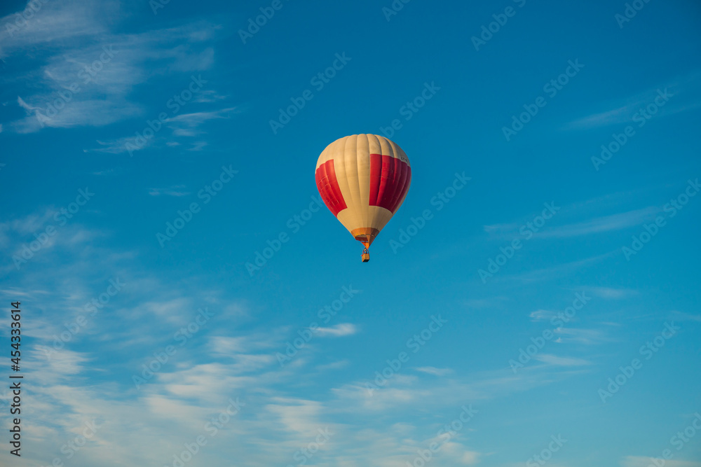 Naklejka premium Hot Air Balloons in Flight. Hot Air Balloon on morning sky background.