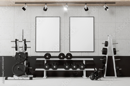 Two posters on the wall in the gym mockup. 3D rendering
