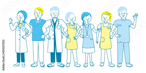 腕を組んで笑っている7人の医療従事者