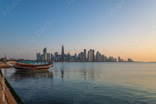 Traditional dhow on a background of a modern city of West Bay Doha, Qatar. © matpit73
