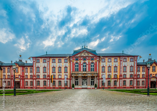 Great view of the Bruchsal Palace at dawn from the cour d'honneur, looking northwest. Also called the Damiansburg, the Baroque palace complex is located in Bruchsal, Germany. 