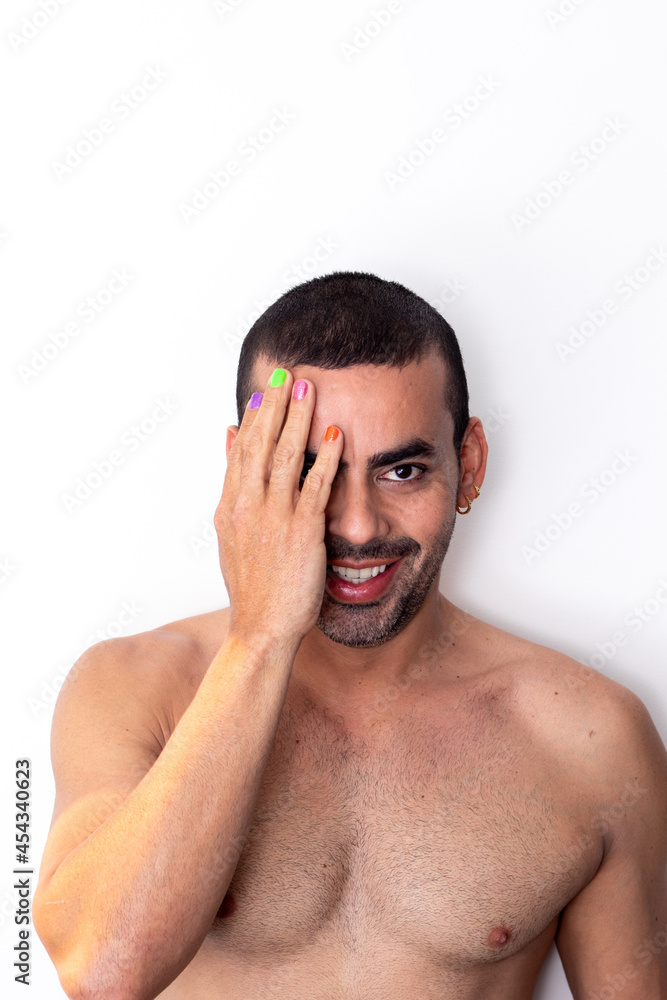 Fototapeta premium gay man rainbow colored nails, no shirt