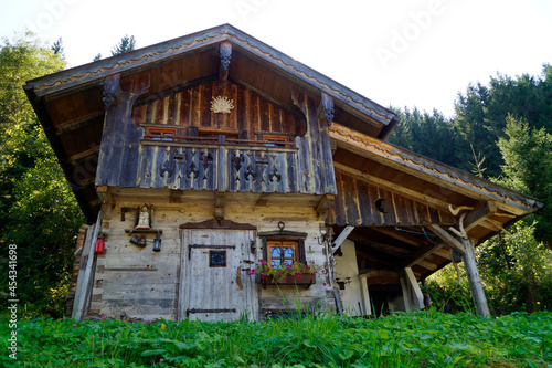 a beautiful traditional rustic wooden house in the Austrian Alps of the Dachstein region (Austria)