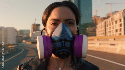 portrait woman wearing gas mask rebellious girl protesting against pollution with respirator for poisonous air global warming climate change emergency
