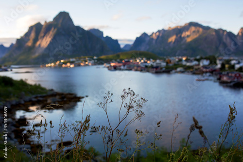 Typical Rourbuer fishing cabins in Lofoten village on a rainy day, summertime