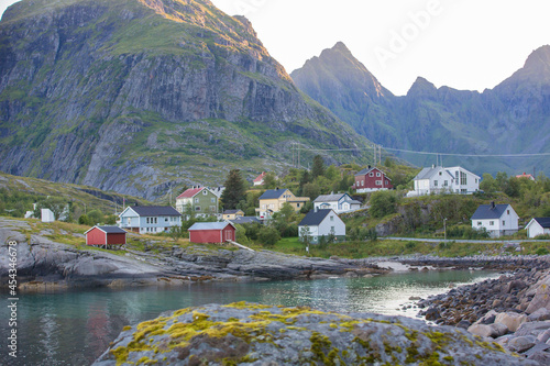 Typical Rourbuer fishing cabins in Lofoten village on a rainy day, summertime