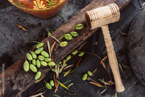 Ergot olives, (Aceitunas de cornezuelo) a variety of Spanish olive, are crushed and dipped in water to cure them in an artisan way.