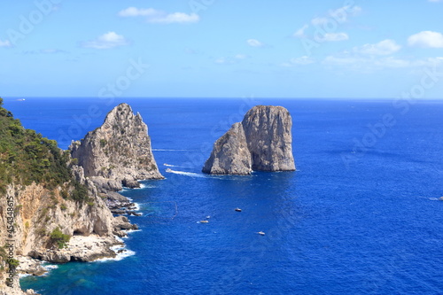 panoramic view of the Capri coastline with Faraglioni rocks, Capri Island, Italy