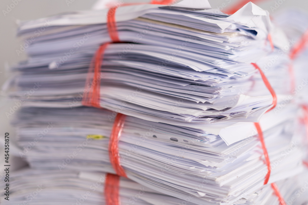 Stack of used paper and old document packed ready to be sent out for recycle Stack of used paper and old document packed ready to be sent out for recycle