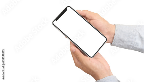 Hand holding smartphone and touching screen