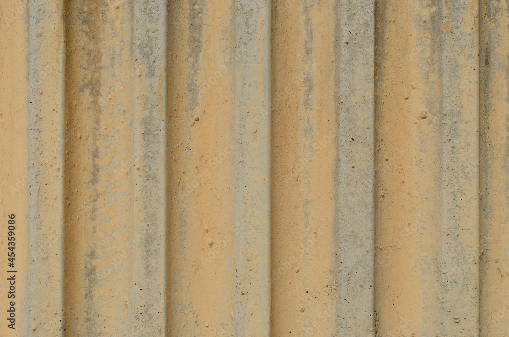 textured material with straight lines and different depths for graphic design. wall with yellow tones without sanding textured material with straight lines and different depths for graphic design. wall with yellow tones without sanding