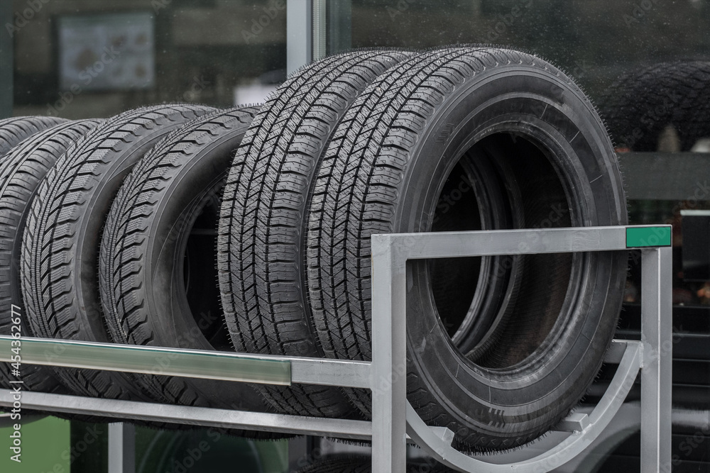 Car tires for the vehicle are stored for sale at the gas station Car tires for the vehicle are stored for sale at the gas station