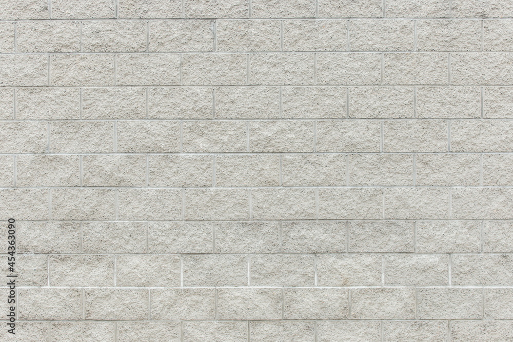 Light grey brick block wall urban texture background