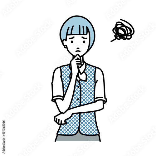 立って手をあごにあてて困っている事務員制服の女性