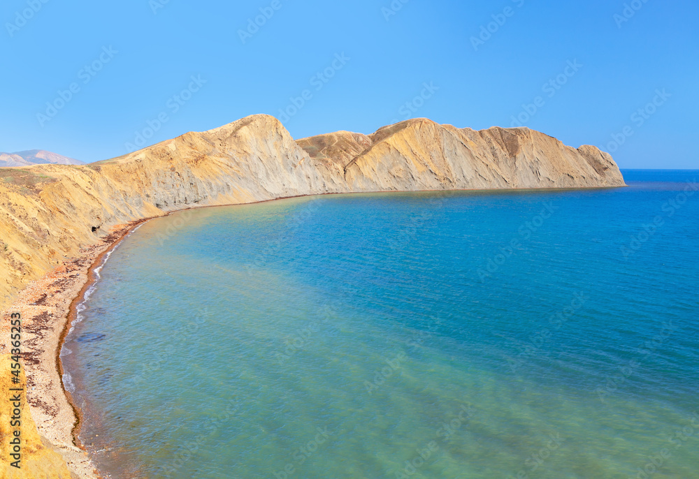 Mull Khameleon in Crimea , Black Sea Coast . Coastal ridge and bay of water 

