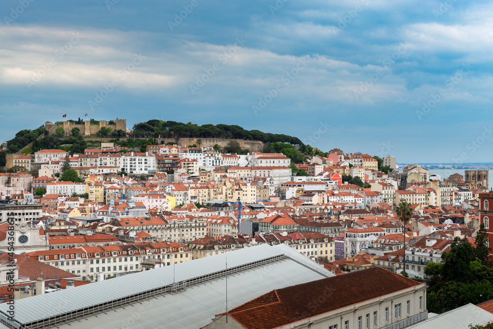 Beautiful view of the downtown of the city of Lisbon from the Sao Pedro de Alcantara viewpoint, with the Pombaline downtown and the Sao Jorge Castle.