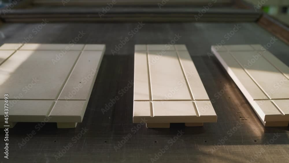 Wood materials before painting. interior of a furniture workshop. Production of panels for wooden furniture. Wood materials before painting. interior of a furniture workshop. Production of panels for wooden furniture.