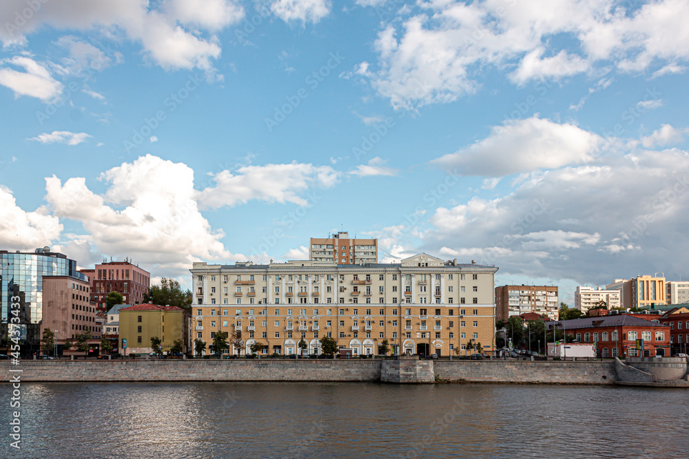 Fototapeta premium Residential building on the opposite bank of the Moscow river