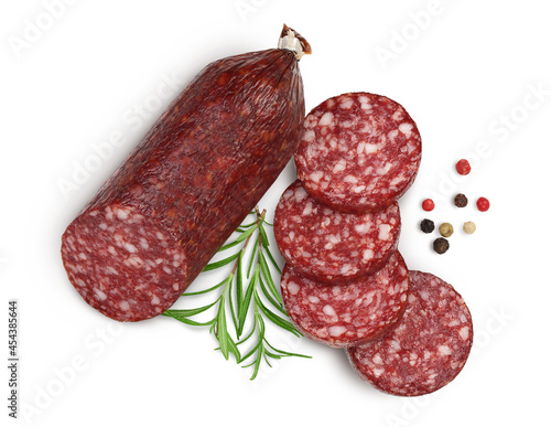 Smoked sausage salami with slices isolated on white background with clipping path and full depth of field. Top view. Flat lay