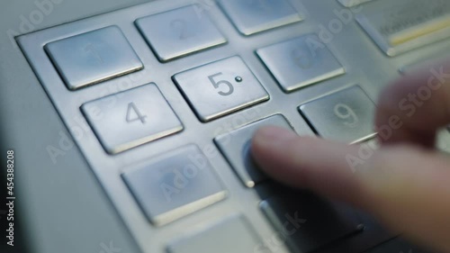 finger pressing enter button on a keyboard ATM EPP photo