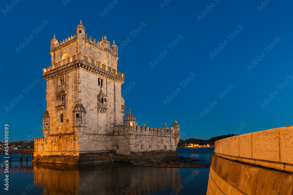 View of the iconic Belem Tower (Torre de Belem) in the bank of the Tagus River, in the city of Lisbon, Portugal.