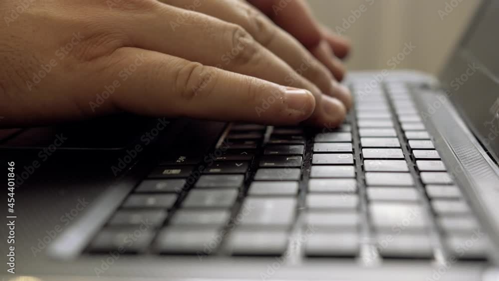 hands typing on computer keyboard, moving camera, business man working on laptop pc in office hands typing on computer keyboard, moving camera, business man working on laptop pc in office