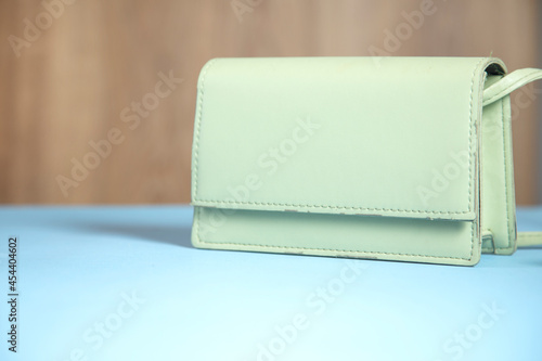 fashion green bag on table
