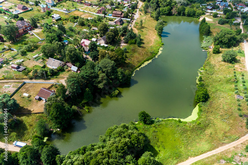 Pond in the village of Lyubitsy, Zhukovsky district, Kaluzhskiy region, Russia. Aerial view of the countryside