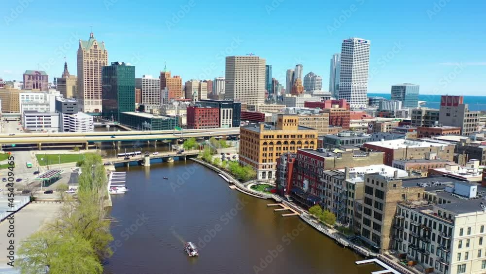 Very good aerial establishing shot of downtown Milwaukee Wisconsin business district, Milwaukee River and skyscrapers. Very good aerial establishing shot of downtown Milwaukee Wisconsin business district, Milwaukee River and skyscrapers.