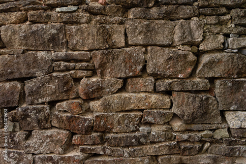 Texture of a stone wall. Old castle stone wall texture background. Stone wall as a background or texture