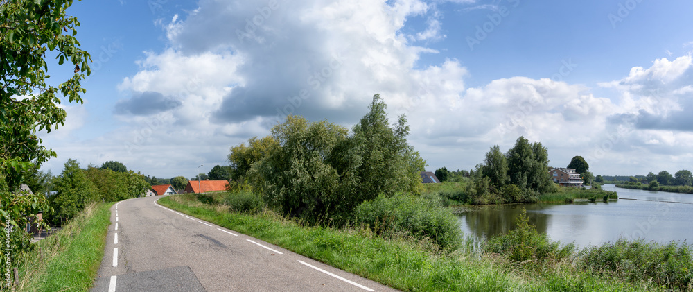 The road over the dike from the Linge river somewhere between Grinchem and Leerdam (NL)