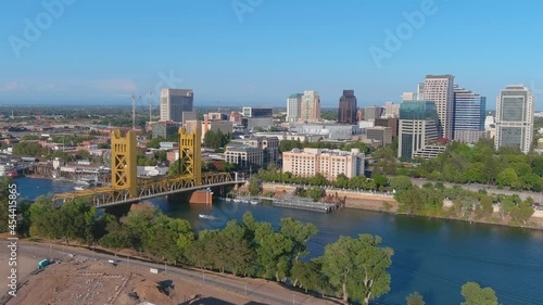 2021 - good aerial establishing shot of skyline downtown Sacramento, California with Sacramento River foreground. photo