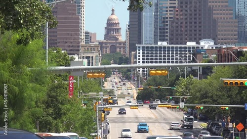 2021 - View traffic down Congress Street in Austin, Texas with Capitol Building in distance. photo