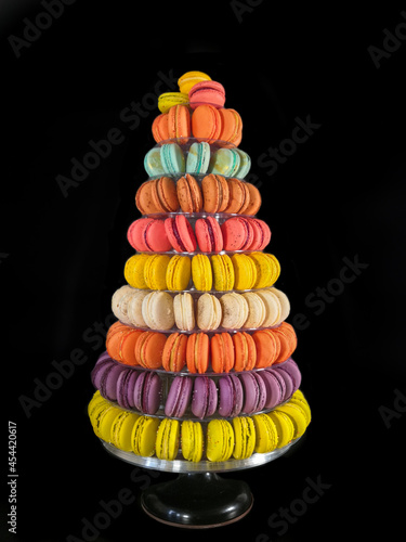 Large pyramid of delicious macaroons with multiple flavors and colors 