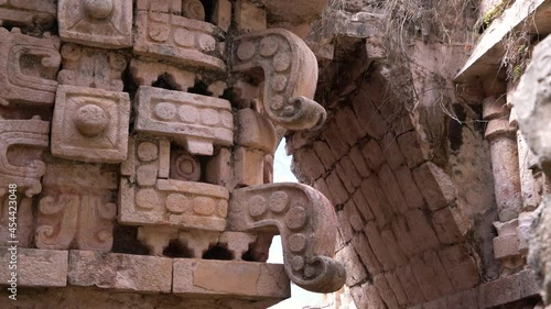 2021 - The face of Chaac, Mayan god of rain, adorns the wall of a temple in Mexico. photo