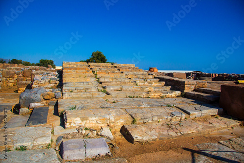 Ruins of the Minoan palace in Malia. Ancient steps. Malia Palace Archaeological Site, Greece, Crete island photo