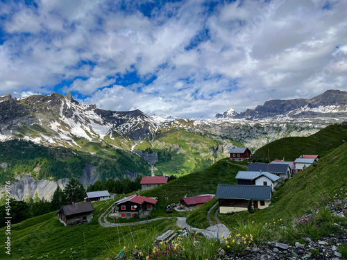 Breathtaking view of rural houses in village of Sion overlooking Swiss mountains