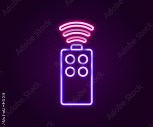 Glowing neon line Remote control for the camera icon isolated on black background. An auxiliary device that allows you to work with a camera from a distance. Colorful outline concept. Vector